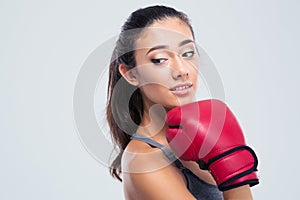 Portrait of a cute fitness woman with boxing gloves