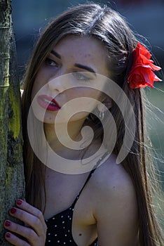 Portrait of cute girl with flower