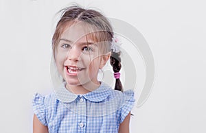 Portrait of cute girl in school uniform