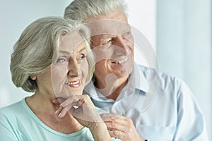 Portrait of cute happy senior couple close-up