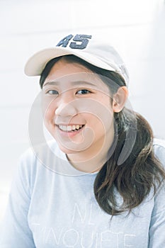 Portrait of cute innocent asian teen women smile