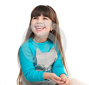 Portrait of cute laughing little girl