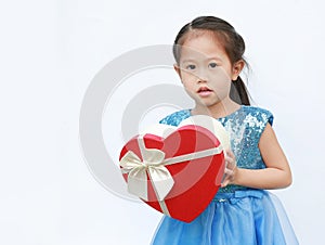 Portrait of a cute little Asian child girl with red heart gift box for Valentine festival isolated on white background