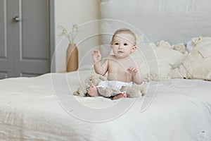 Portrait of cute little baby girl at home