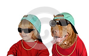 Portrait of a cute little blonde girl with American Pit Bull Terrier dog in the studio