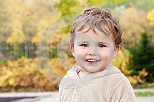 Portrait of cute  little  boy. Happy lovley child looking at camera photo