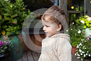 Portrait of cute  little  boy. Happy lovley child outside. Look aside photo