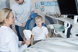 Little Boy Visiting Modern Dental Clinic