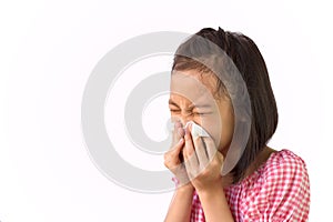 Portrait of cute little girl blowing nose in paper handkerchief,Asian girl sneezing in a tissue isolated on white background,hay