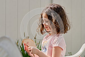portrait of a cute little girl having fun in the backyard