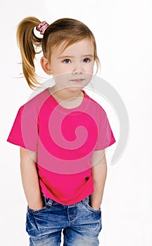 Portrait of cute little girl in jeans and t-shirt