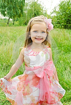 Portrait of cute little girl in princess dress