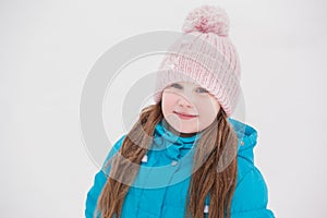 Portrait of cute little girl in winter