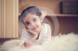 Portrait of cute little latino girl photo