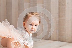 Portrait of a cute little one-year-old girl