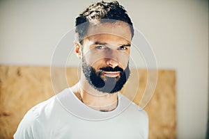 Portrait of a cute man wearing white tshirt