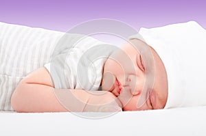 Portrait of a cute newborn sleeping baby