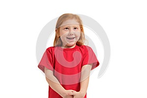 Portrait of cute redhead emotional smiling very happy little girl isolated on a white