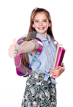 Portrait of cute smiling happy little school girl child teenager with finger up and backpack holding the books isolated