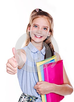 Portrait of cute smiling happy little school girl child teenager with finger up and books isolated