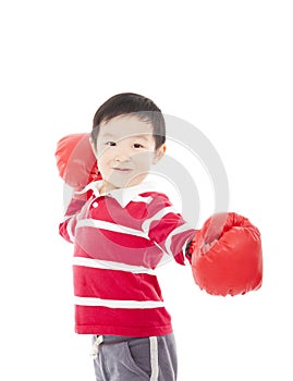 Portrait of a cute sporty boy in boxing gloves