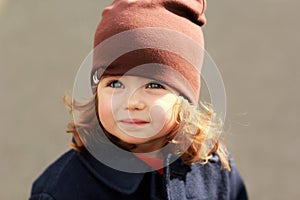 Portrait of a cute stylish one year old girl