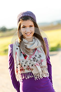 Portrait of cute teen girl with scarf and beanie.