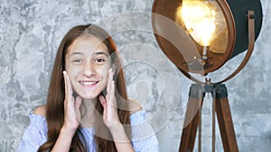 Portrait. cute teen girl showing surprise gesture