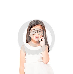 Portrait of cute thoughtful asian child girl wear glasses eyes isolated on white background . Imagine, idea ,fun ,dreaming ,