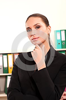Portrait of cute young business woman smiling