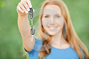 Portrait cute young woman car keys