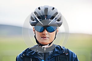 Portrait, cycling or girl athlete in nature for exercise, workout or training for triathlon sports or fitness. Woman