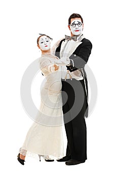 Portrait of dancing couple of mimes