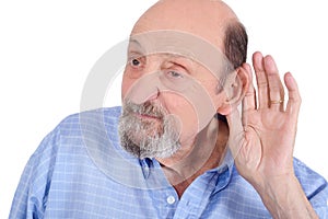 Portrait of deaf old man trying to listen