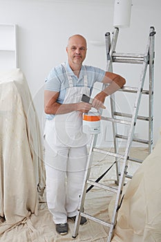 Portrait Of Decorator Painting Room