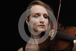 Portrait of dedicated professional woman violinist