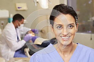 Portrait Of Dental Nurse In Dentists Surgery