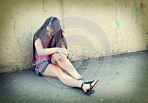 Portrait of depressed teenager girl.