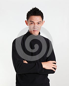 Portrait of determined goodlooking man wearing black shirt,asian young man