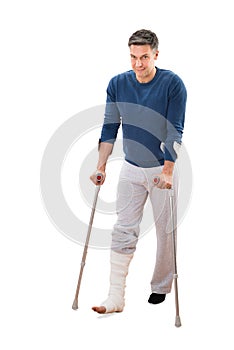 Disabled Man Using Crutches For Walking