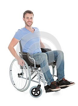 Portrait of disabled man on wheelchair