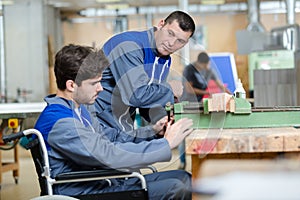 portrait disabled worker in factory