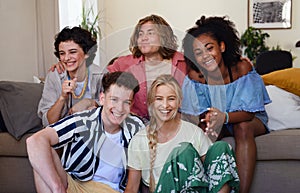 Portrait of diverse group of friends with mixed races having fun together indoors, Friendship and lifestyle concepts