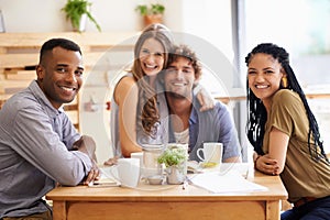 Portrait, diversity and group of friends in restaurant together for bonding, social gathering and smile at lunch. Coffee