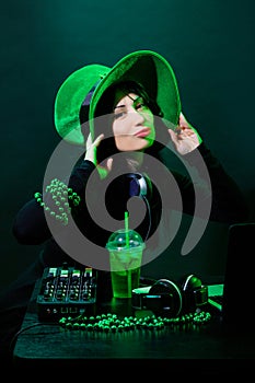 Portrait dj headphone st Patrick green hat cocktail drink equipment disco girl party desk mixer glamour disc young woman girl