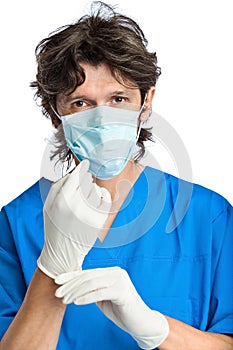 The portrait of doctor in gloves