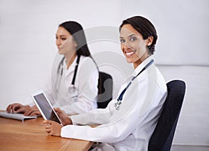 Portrait, doctor and happy woman with tablet in hospital for healthcare, wellness or coworking online. Face, smile or