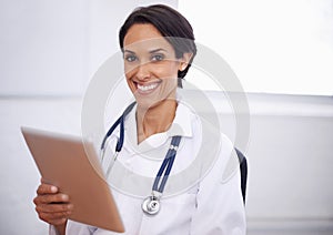 Portrait, doctor and happy woman with tablet in hospital for healthcare, wellness or telehealth online. Face, smile and