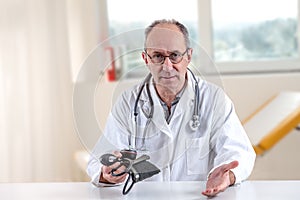 Portrait of a doctor at hospital wearing protective mask