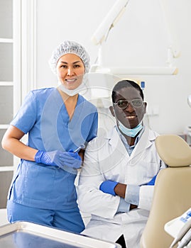 Portrait of doctor and a nurse in dental office